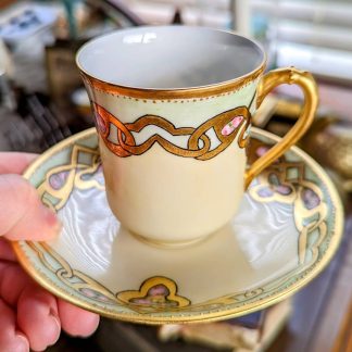 Art Nouveau gilt floral bone china cup and saucer set