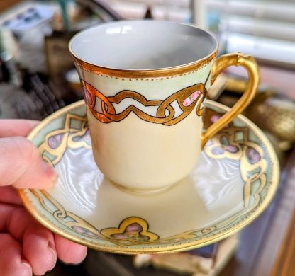 Art Nouveau gilt floral bone china cup and saucer set