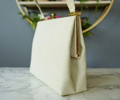 Vintage white textured fabric tote with gold hardware - Image 2