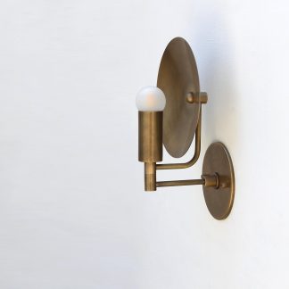 Brass reflective disc and column wall light