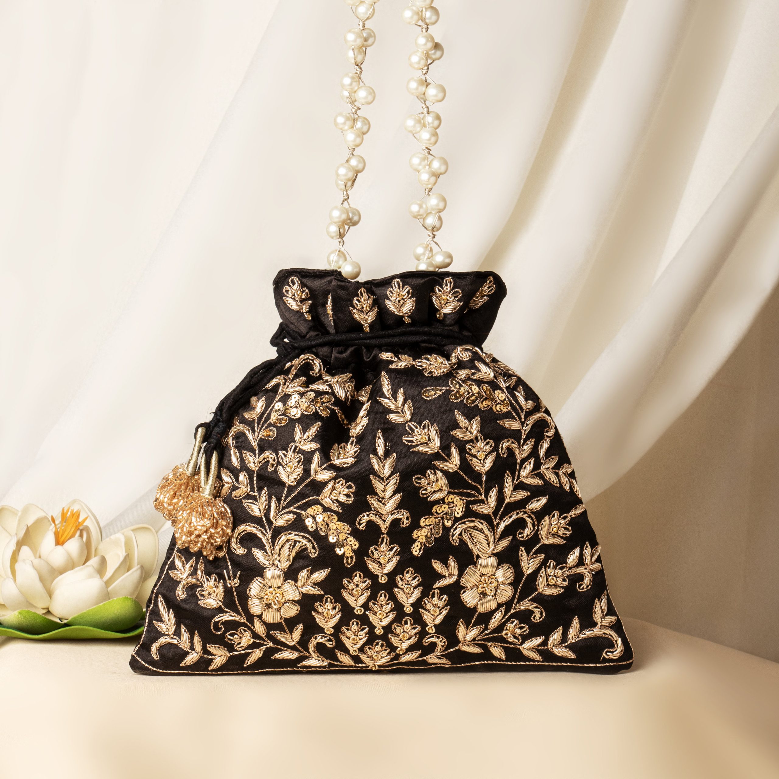Black and gold floral embroidered Potli bag