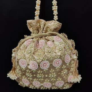 Champagne and blush rosette beaded handbag