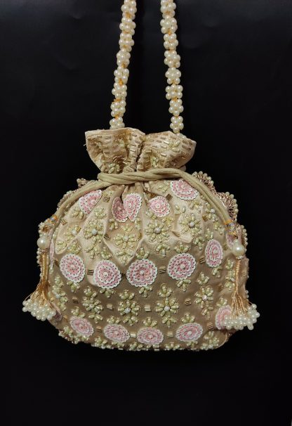 Champagne and blush rosette beaded handbag
