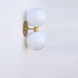 Brass center ring and double opal globe wall light