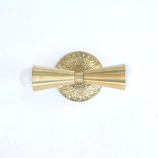 Hourglass-shaped brass body and twin opal bulb wall light