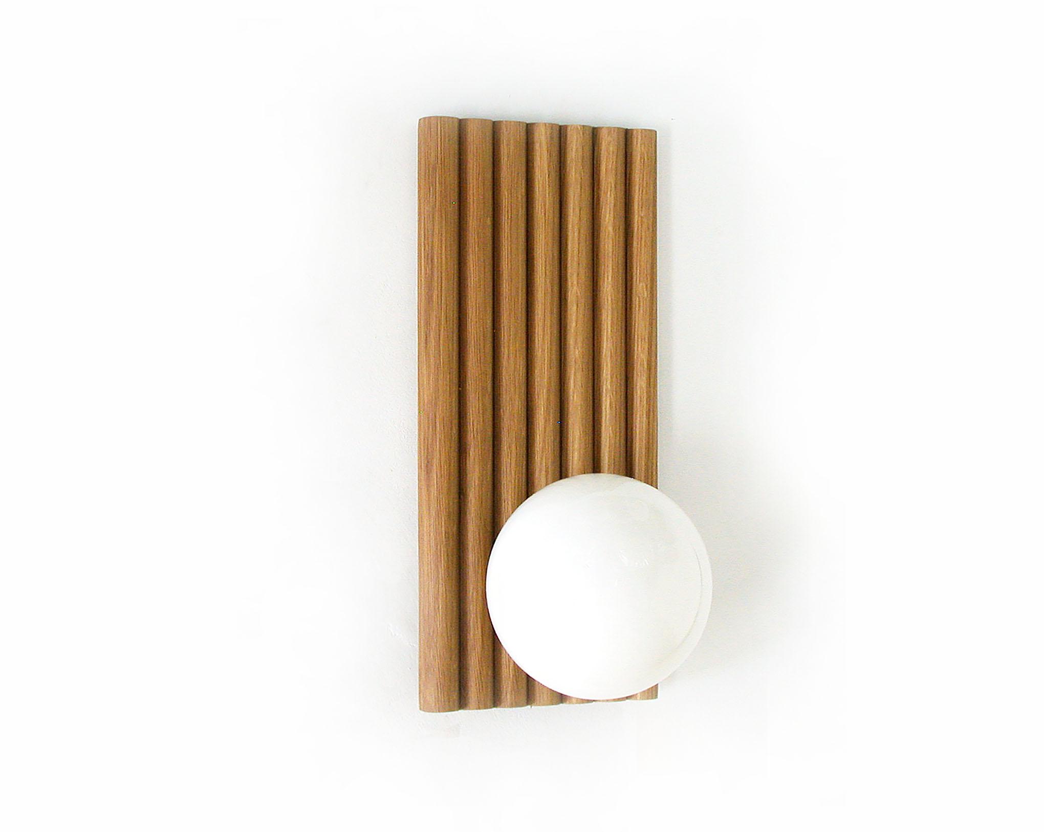Wood panel and opaline glass globe wall lamp