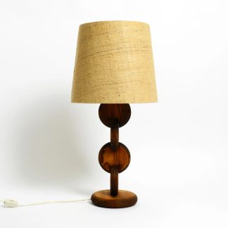 Carved wooden disc table lamp