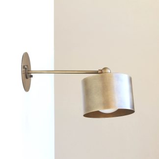 Brass ball joint arm and metal drum shade wall lamp