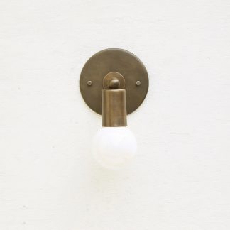 Brass ball joint and opalescent bulb wall lamp