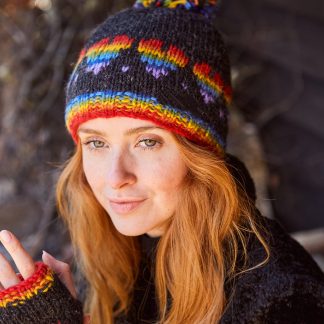 Rainbow fireside pom-pom knit hat