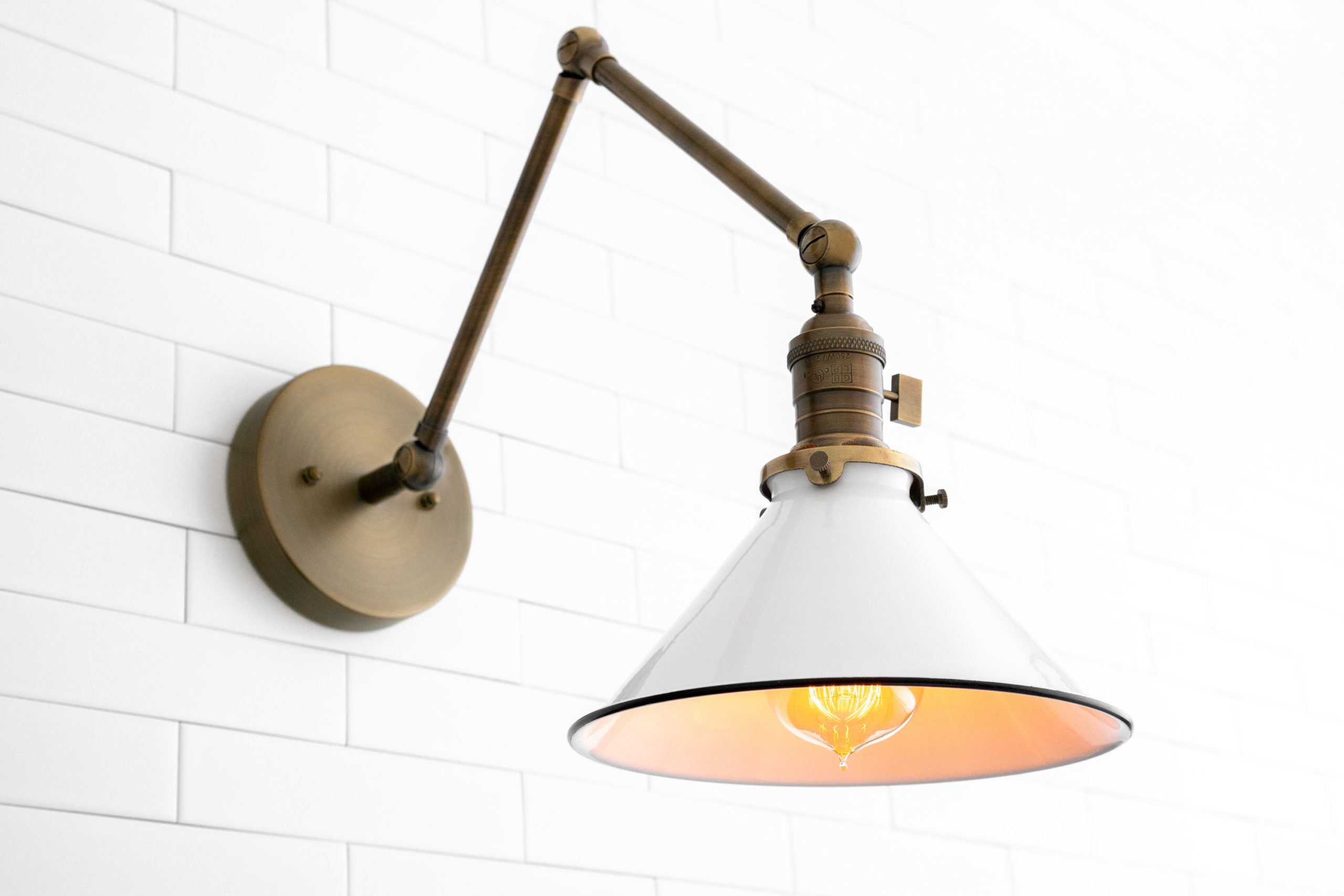 Adjustable white enamel cone wall lamp