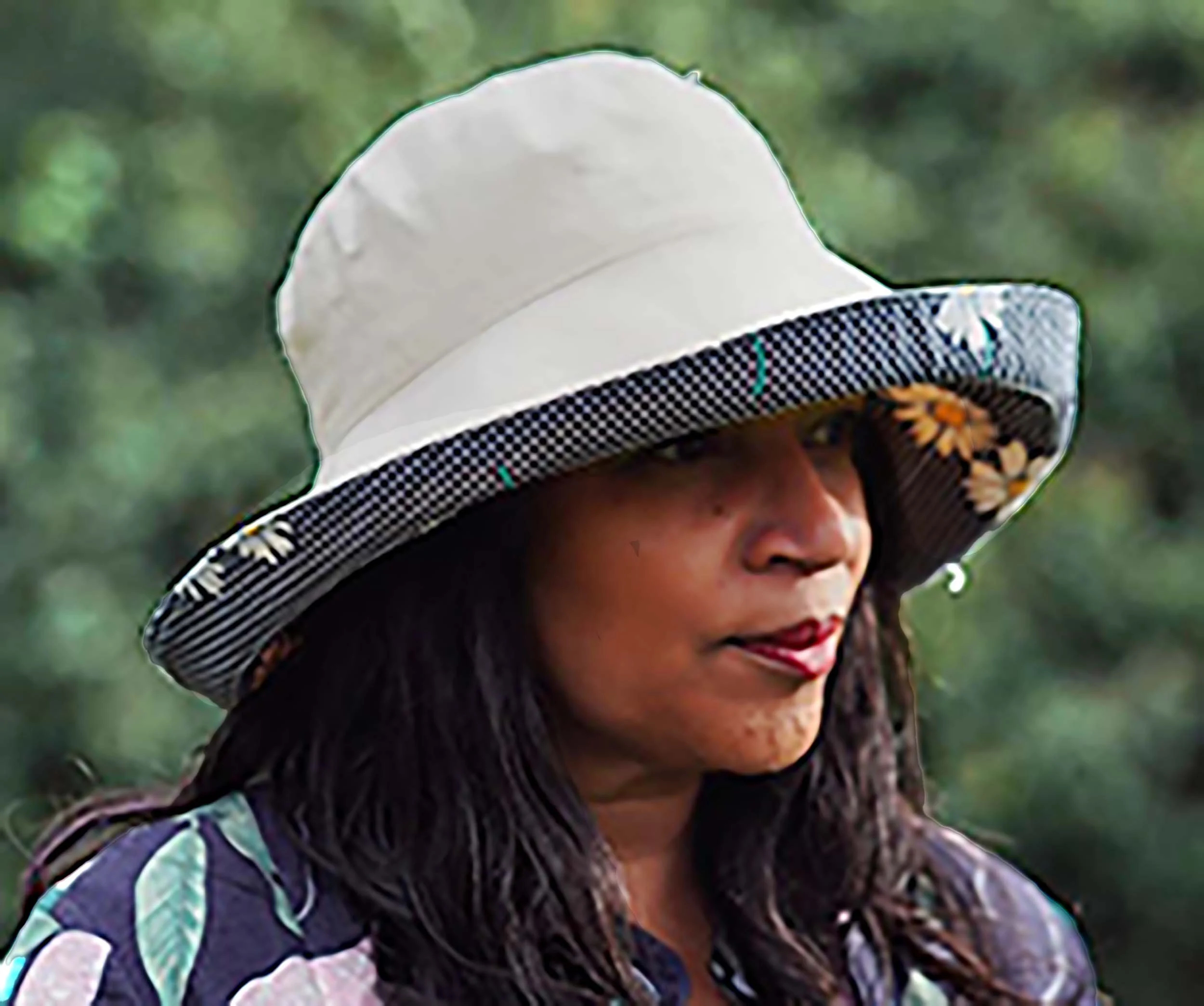 Cream-colored daisy-print sun hat with brim