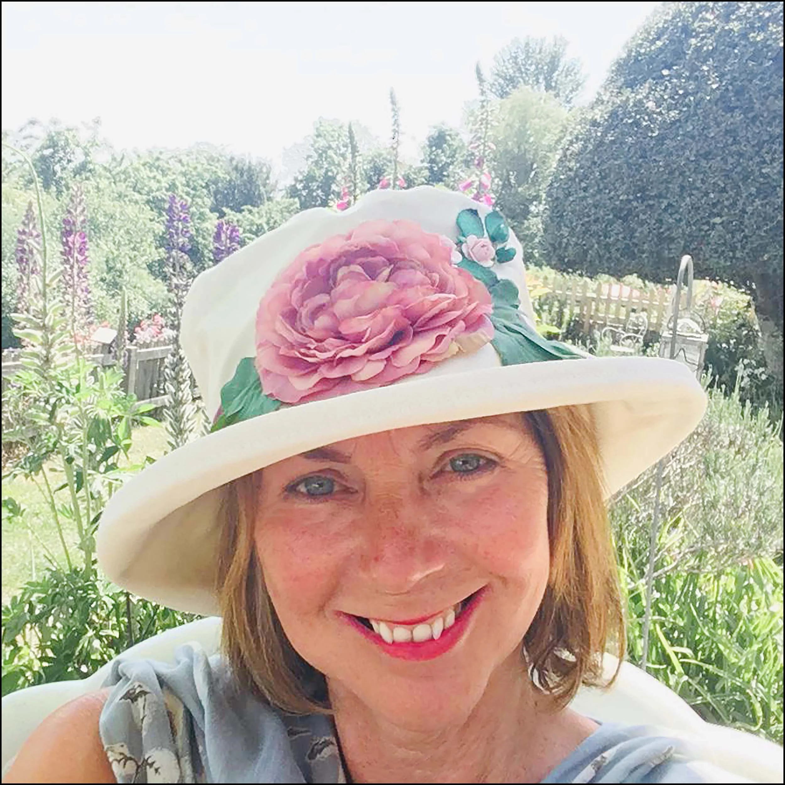 Cream-colored floral-decorated sun hat - Image 4