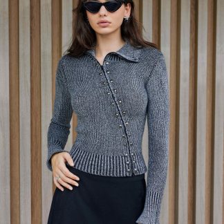 Asymmetrical button ribbed knit turtleneck sweater