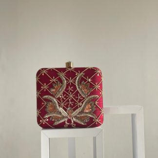Embroidered red square evening clutch