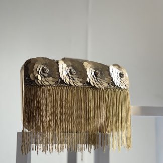 Gold sequined tassel clutch