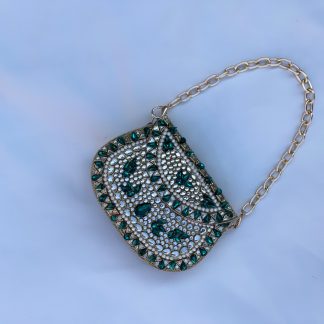 Emerald-encrusted mini clutch