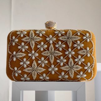 Embroidered mustard gold flower clutch