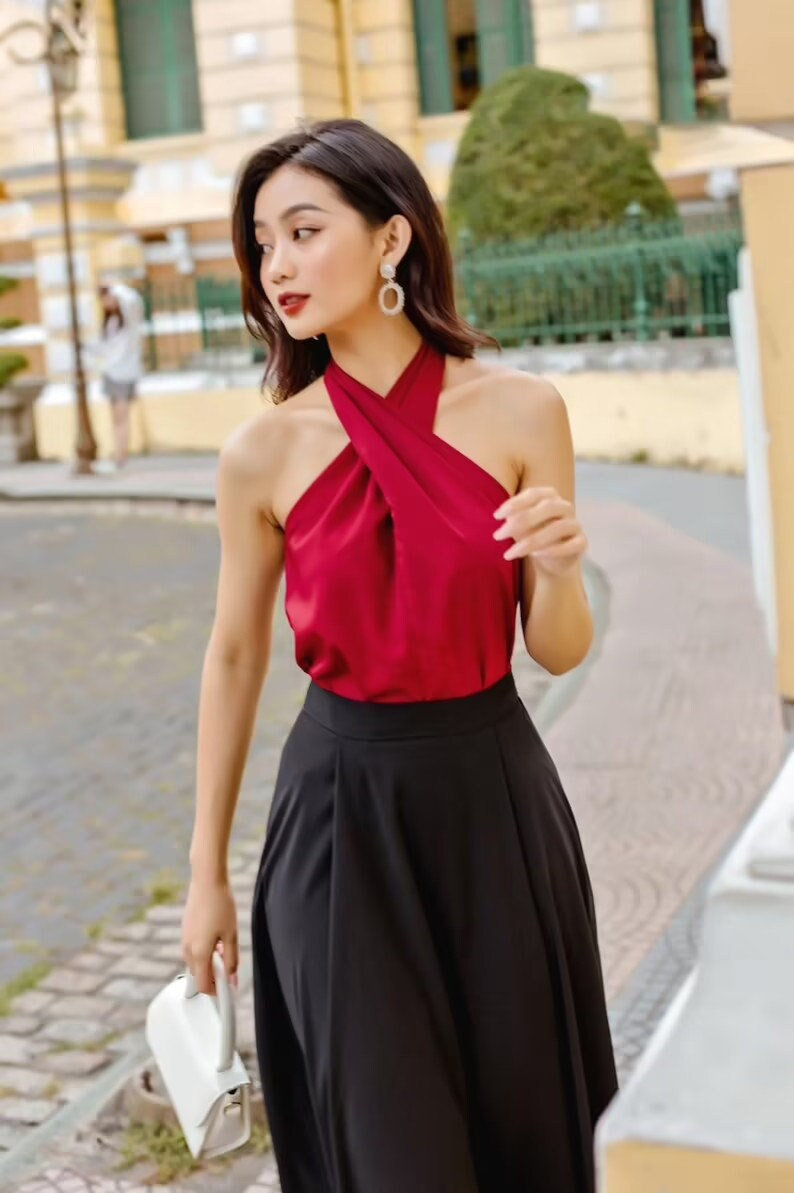 Cross-strap satin top